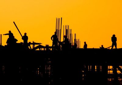 construction-workers-sunset-min