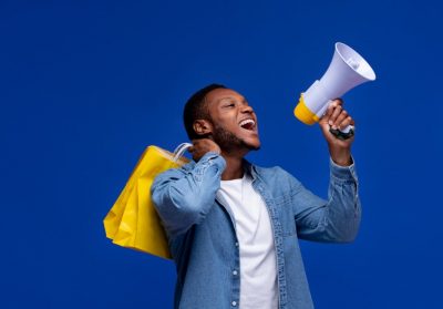 medium-shot-man-holding-megaphone-min